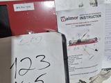 a pile of papers and other items on a table