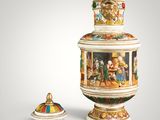 a large vase and a small box on a table