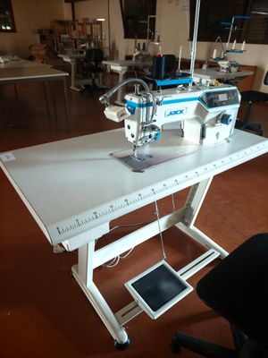a sewing machine that is sitting on a table