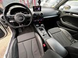 the interior of a car with a steering wheel, dashboard and dashboard controls