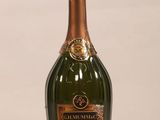 a bottle of champagne that is sitting on a table