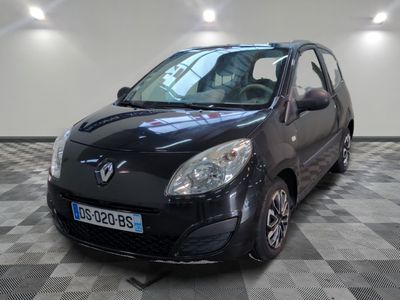 a picture of a small black car parked on a checkered floor