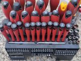 a bunch of tools that are sitting in a holder