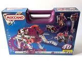 a box with a toy set in it on a white surface