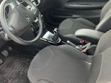 a car that has a steering wheel and a dash board