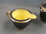 two cups that are sitting on a table