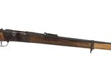 a rifle with a wooden barrel on a white background