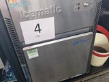 a refrigerator that is sitting on the side of the street