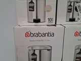 three boxes of brabantia coffee maker sitting on top of each other