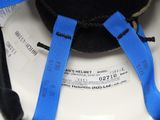 a black hat with a blue ribbon on top of it