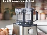 an image of a food processor sitting on a counter