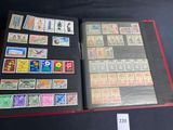 a lot of stamps in a folder on the table