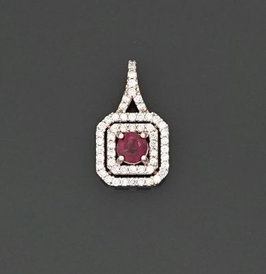 Pendentif en or gris 18K 750 millièmes ornée d'un rubis de t…