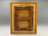 an old picture frame with a wooden shelf in it