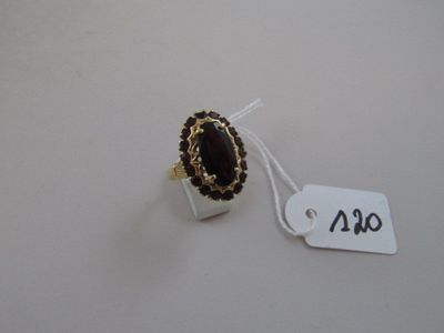 a ring with a black stone on it and a price tag