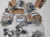a lot of different kinds of electronic components on the table
