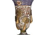 a vase that is sitting on a white surface