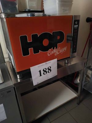 a picture of a coffee machine with a sign on it