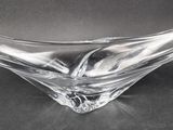 an image of a clear glass bowl on a black surface