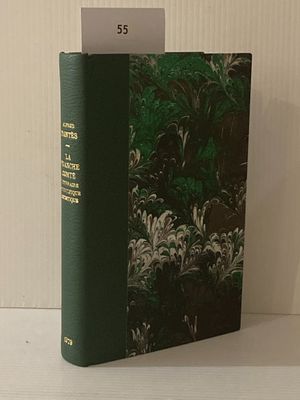 un livre vert sur lequel figure l'image d'une forêt