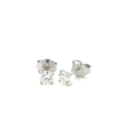 pair of diamond stud earrings on a white background