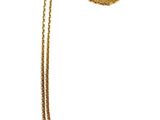 gros plan d'un collier sur une surface blanche avec une chaîne