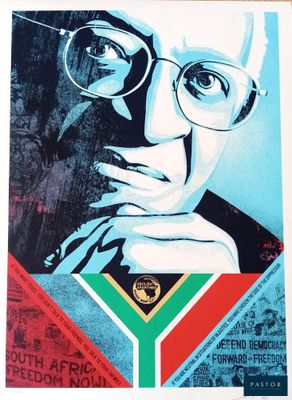 a poster of a man with glasses and a tie