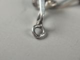 a close up of a pair of scissors on a table