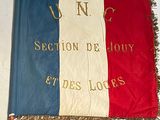 a flag that is hanging on the wall
