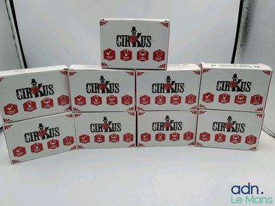 several boxes of chips stacked on top of each other on a table