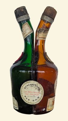 two bottles of liquor sitting next to each other