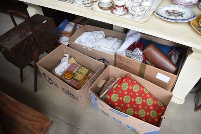 a table with a lot of boxes of items on it