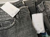 a picture of a pair of jeans with a price tag on it