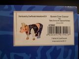une carte sur laquelle figure une vache portant un chapeau de cow-boy