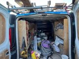 a van that has a lot of stuff inside of it