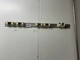 a close up of a door handle with a bunch of knobs on it