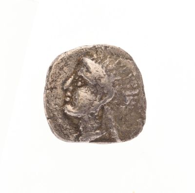 l'image d'une pièce d'argent représentant le visage d'une femme