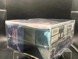 a close up of a clear box on a table with a black background