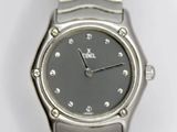 an image of a close up of a wrist watch on a white surface