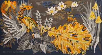 a picture of a rug with a bird and flowers on it