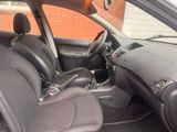the interior of a car with a steering wheel and a dashboard