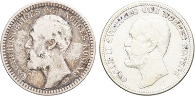 a close up of two silver coins on a white background