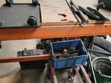 an image of a workbench in a garage with tools