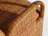 an image of a wicker basket with a handle on a white background