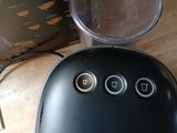 a blender sitting on a table next to a blender and a blender