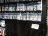 many dvds on the shelves in the store
