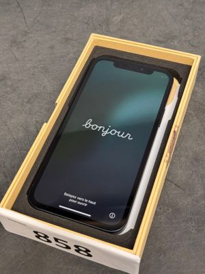iphone x box with box open showing the back side of the phone