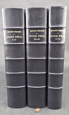 four black books are stacked on top of each other on a table
