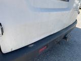 a close up of the rear bumper of a white truck