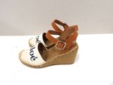 an image of a pair of sandals with a name on them